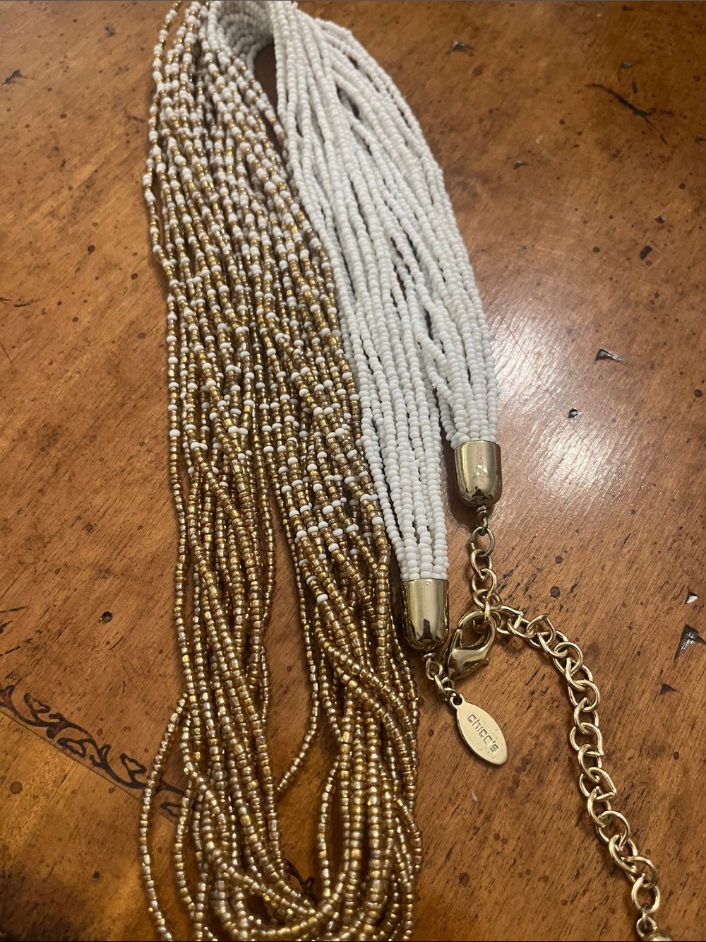 Chicos sea bead white and gold long necklace